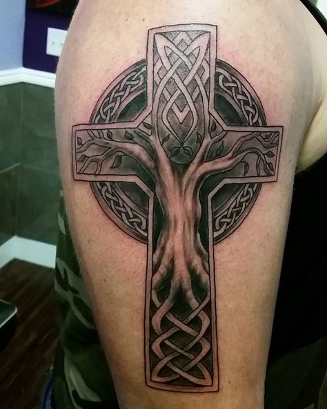 Celtic Cross and Tree of Life Tattoo | Tattoo Ideas and Inspiration Irish Sleeve Tattoo, Celtic Cross Tattoo For Men, Celtic Cross Tattoo, Celtic Tree Tattoos, Celtic Sleeve Tattoos, Celtic Tattoos For Men, Flower Of Life Tattoo, Cross Tree, Shamrock Tattoos