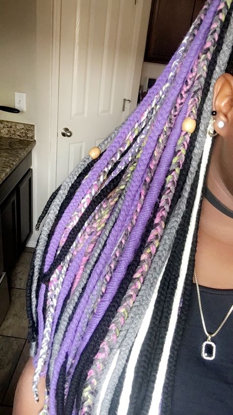 Pinterest: CreativeTayy . Yarn Styles Hair Braids, Multicolored Braids, Colored Yarn Braids, Yarn Hairstyles, Yarn Hairstyles Braids, Purple And Blonde Braids, Multi Colored Box Braids, Blonde And Purple Braids, Colorful Box Braids