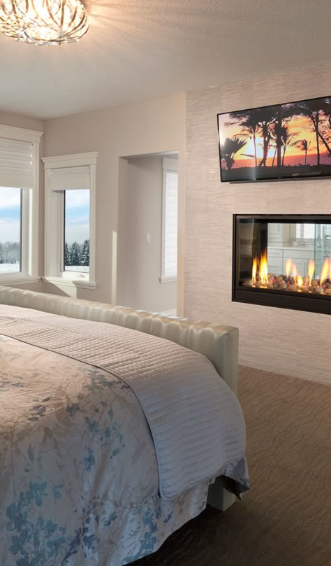 Luxury master bedroom with a 2-way gas fireplace and flat screen TV Bedroom Ideas With Tv, Tv On Wall, Bedroom With Fireplace, Master Suite Remodel, Neutral Bedrooms, Flat Screen Tv, Bedroom Fireplace, Bedroom Color, Luxury Bedroom Master