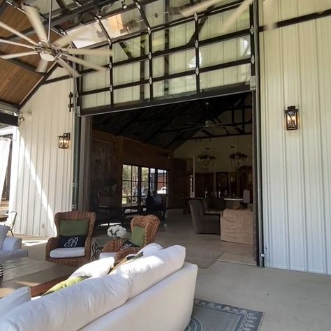 Stacee Lynn on Instagram: “Some of you have asked what the glass garage door looks like opening from the porch side.  Here is that view. . The door is 16’ wide x 12’…” Forever And Ever Amen, Glass Garage, Metal Building House Plans, Barn House Interior, Barn Homes Floor Plans, Metal Building Home, Barn House Design, Glass Garage Door, Randy Travis