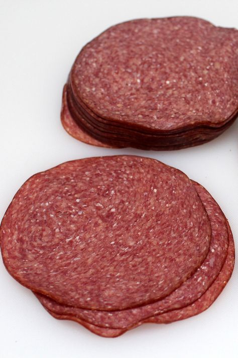 This well known American sausage has its roots in the town of Lebanon, Pennsylvania, where it was made by German settlers. Lebanon Bologna is a semi-dry, fermented, heavily smoked, all-beef sausage which is not cooked. The traditional process (no starter cultures) calls for curing beef at 4-6º C (40-43º F) for 10 days. Lebanon Bologna Recipe, German Bologna Recipe, Sweet Lebanon Bologna Recipe, Deer Bologna Recipe, Dried Sausage Recipe, German Bologna, Butcher Recipes, Homemade Bologna, Lebanon Bologna