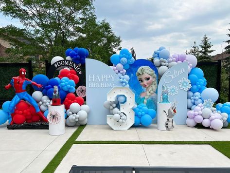 Alex | Balloon Stylist and Coach in Toronto 🇨🇦 on Instagram: “Showstopper! One word to describe this almost 20ft wide set up 😁… I’ll be reading 👀👇🏻 #elsaballoons #frozenballoons #spidermanballoon…” Twins Birthday Decoration Ideas, Sonic Theme Balloon Garland, Frozen Garland Balloon, Twins Birthday Party Themes, Frozen Themed Balloon Garland, Blue Double Stuffed Balloon, Disney Frozen Balloon Garland, Twins Birthday Party, Frozen Birthday Decorations