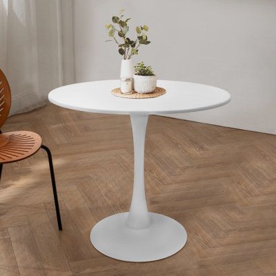 Do you want to buy a small table for afternoon tea, camping, and coffee at home? This modern white small round table has a diameter of 31.5 inches and is made of density board. The center pillar is made of sturdy iron to ensure the longevity of the table and allow you to easily enjoy your rest time. The white circular versatile design is simple and fashionable and can be paired with different decorative styles. | Orren Ellis Round Dining Table White Coffee 31.5in Table End Side Table Bar Pedesta Small Circle Table, Round Kitchen Table Decor, Small Pedestal Table, Side Table Bar, White Pedestal Table, Round Dining Table White, White Round Table, Small Tea Table, Round Dinner Table