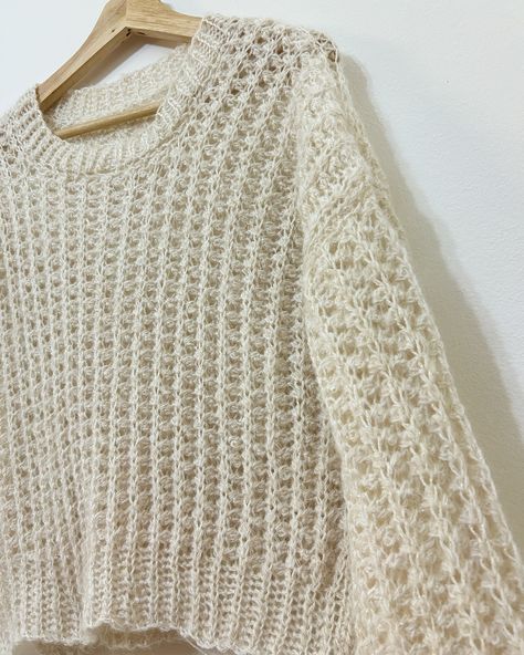 Imagine wrapping yourself in a cloud—soft, cozy, and sparkling in the light. ✨ This stunning crochet sweater - The #Ariasweater by the talented @lelaarapi, handcrafted with two strands of delicate yarn and just the right touch of shimmer, is exactly that! #crochet #crochetaddict #crochetlove #crochetshirt #yarnlove #crochetpattern White Crochet Sweater, Practical Crochet, Garment Pattern, Crochet Shirt, White Crochet, Crochet Sweater, Handmade Crochet, The Light, Crochet Patterns