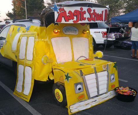 This trunk was brought to you by an suv, cardboard, and lots of yellow butcher paper. Golf Cart Decorations, Yellow Jeep, Trunk Or Treat Ideas, Halloween Snacks For Kids, The Magic School Bus, Halloween Themed Birthday Party, Fun Halloween Party Games, Dad Crafts, Harvest Fest