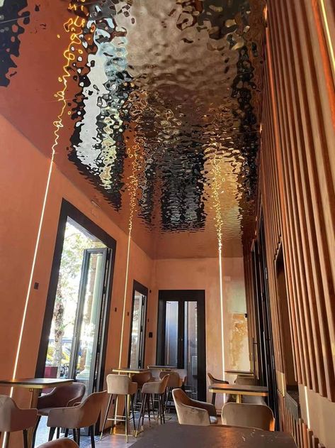 Water Ripple effect stainless steel ceiling in restaurant. #ceiling #interiorceiling #ceilingdesign #waterrippleceiling #stainlesssteelceiling #metalceiling #waterripple Restaurant Interior Design, The Ceiling, Restaurant Interior, Commercial Design, Commercial Interiors, A Restaurant, Ceiling Design, Restaurant Design, 인테리어 디자인