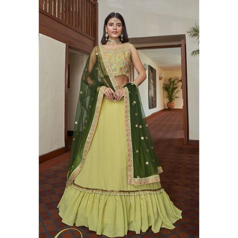 About Product :- Make a shiny statement adorning this ready made fresh yellow colored chiffon lehenga crafted with thread and mirror embroidery all over. Paired along with a matching colored silk & net choli and a fresh Green colored dupatta, both in similar work embroidery .

Lehenga Choli Fabric:-

Lehenga Fabric:-

Blouse Fabric:-Titan Silk
Dupatta Fabric:- Butterfly Net
Work : Embroidery
Size : Semi Stitched Up To 44
Occasion: Sangeet, Festive, Wedding, Engagement Light Green Lehenga, Green Lehenga Choli, Lehenga Choli Designs, Bollywood Lehenga, Green Lehenga, Blue Lehenga, Lehenga Online, Net Lehenga, Lehenga Choli Online