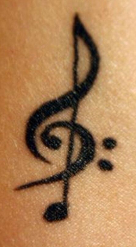 Treble and Bass clef tattoo Bass Note Tattoo, Treble Bass Clef Tattoo, Treble Clef Bass Clef Tattoo, Bass And Treble Clef Tattoo, Bass Clef Tattoo Men, Bass Clef Art, Music Clef Tattoo, Bass Guitar Tattoo, Bass Clef Tattoo