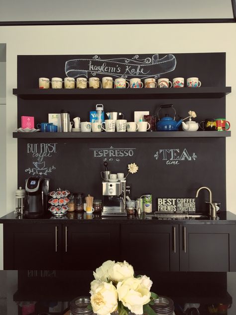 Coffee bar with chalkboard, black cabinets, floating shelves and granite. Trough sink. Bar Chalkboard Ideas, Bar With Floating Shelves, Ikea Bar, Kitchen Chalkboard, Floating Table, Black Floating Shelves, Coffee Bar Design, Chalk Wall, Trough Sink