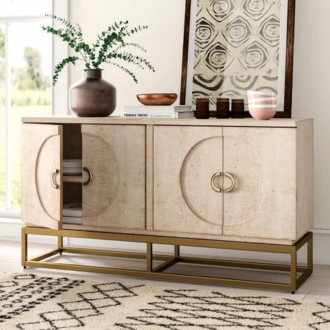 Combining boho-chic style with glam accents, this sideboard is a perfect pick for sprucing up any arrangement! Founded atop a stainless steel base awash in an eye-catching gold hue, this piece features coordinating handle pulls and an oak top in a natural tone accented by light distressing. Four cabinet doors on magnetic catches conceal an interior shelf that offers plenty of space to store cutlery, linens, and other entertaining essentials. Terracotta Palette, Iron Table Legs, Mdf Cabinets, Wide Sideboard, Entertaining Essentials, Modern Sideboard, Wood Countertops, Iron Table, Wood Sideboard