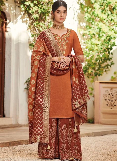 Multicolor Orange Embroidered Palazzo Suit features a pure dola silk kameez with pure dola silk bottom and pure dola silk banarasi dupatta. Embroidery work is completed with zari, stone and thread embellishments on this style. Designer Sharara Suits, Latest Salwar Kameez Designs, Indian Suits For Women, Rust Colour, Salwar Suits Party Wear, Orange Suit, India Clothes, Pakistani Suit, Palazzo Suit