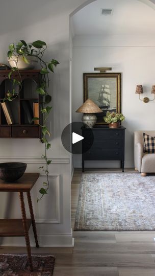 52K views · 3.8K reactions | Whether you’re the first, second, 10th owners, and you want a clean slate, pick an easy neutral for all the walls and don’t stress about it… You can always go back and layer in new colors or wallpaper as you live there. I chose Sherwin Williams Pure White for the whole house bc I knew it would work well behind all of my vintage furniture, frames, etc, and I knew it would brighten up the rooms that didn’t have much natural light. 
I’ve been thinking about painting that back room a different color. BUT, I also love it this way. The white is so calming and I love the way it makes all the art and these beautiful floors shine. I’m doing dark builtins so the question is, do I continue the dark color through the whole room? What do you think?

#foyerinspo #entryway #g Entryway Wall Color, Sherwin Williams Pure White, Back Room, Entryway Wall, Clean Slate, I Knew It, Dark Color, Sherwin Williams, Pure White