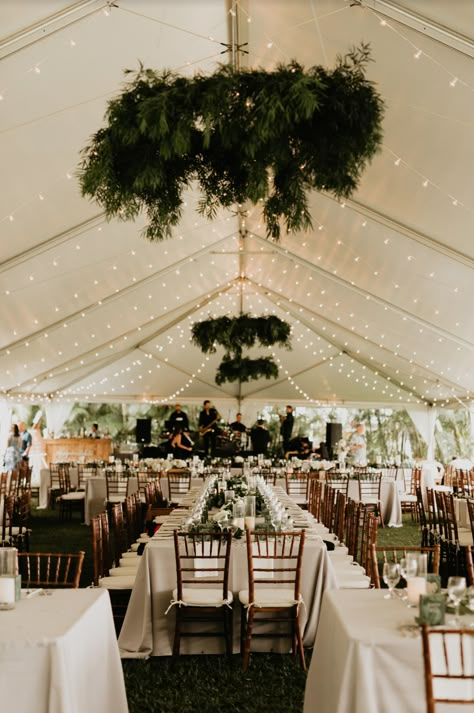 Reception Lights Indoor, Big White Wedding Tents, Outdoor Covered Wedding Reception, Clear Tent With Lights And Greenery, Neutral Wedding Venue Decor, How To Decorate A White Wedding Tent, White Frame Tent Wedding, Tent Wedding With Lights, Under Tent Wedding Reception