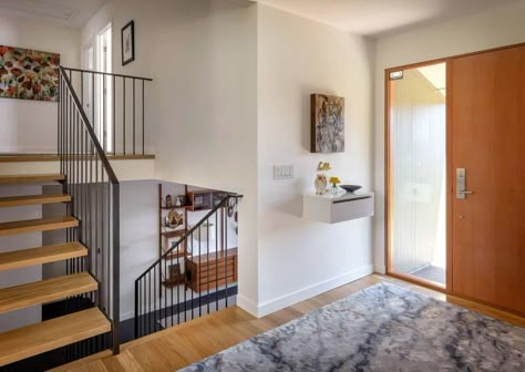 A 1970s split-level modern home gets an amazing makeover in Portland Split Level Extension Ideas, Split Level Open Floor Plan, Staircase Split Level, Open Concept Split Level House, Split Level Extension, Large Split Level Entryway, 60s Split Level Remodel, Split Level House Decor, Split Level Home Entryway Ideas