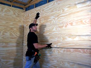 Woodshop Wall Ideas, Garage Wall Covering Ideas, Interior Shed Wall Ideas, Shop Wall Ideas, Finish Garage Walls Cheap, Plywood Garage Walls, Garage Wall Covering, Garage Walls Covering Ideas, Shed Wall Ideas