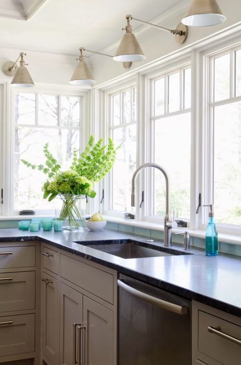 Light sconces over kitchen sink with lots of windows Kristina Crestin, Over Kitchen Sink, Kitchen Sink Window, Серая Кухня, Replacement Windows, House Of Turquoise, Grey Decor, Grey Kitchens, Grey Kitchen