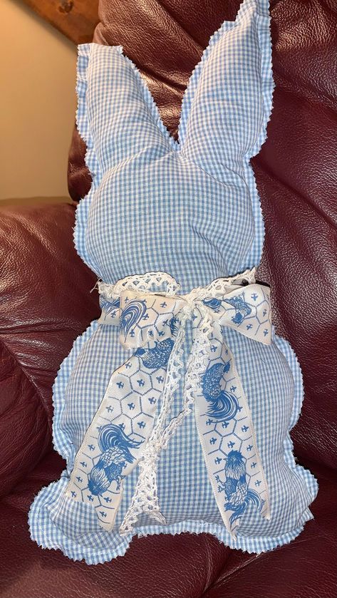 This is a sewn stuffed bunny made from vintage fabric and lace. This is a blue and white gingham check fabric that is perfect for any country , farmhouse, Easter decor. It has a blue country ribbon bow around the neck .  He measures about 16" tall and about 8" wide. This is not a toy and is for decorative use only! Baby Proofing, Check Fabric, Gingham Check, Mix Match, Vintage Fabric, Ribbon Bows, Gingham, Seasonal Decor, Blue And White