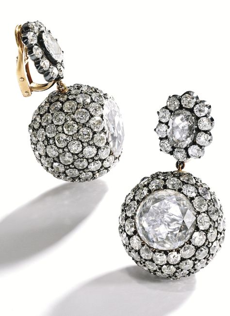 PAIR OF SILVER-TOPPED-GOLD AND DIAMOND BALL EARCLIPS, CIRCA 1860 The tops centered by two oval-shaped diamonds weighing approximately 2.40 carats, suspending spherical drops centered by two table-cut diamonds measuring approximately 13.5 by 13.6 mm and 14.6 by 13.5 mm, accented throughout with numerous old mine and old European-cut diamonds weighing approximately 38.00 carats, with French assay marks; earclip backs of modern design. Diamond Ball, Jeweled Earrings, Royal Jewels, Silver Tops, European Cut Diamonds, Victorian Jewelry, Amethyst Necklace, Vintage Jewels, Van Cleef