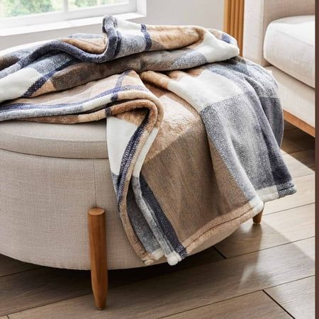 Warm up your home with a stylishly plush throw! This Better Homes & Gardens Heavyweight Adult Throw in Neutral Plaid is an insulating addition to your space with a plush finish that feels like a dream. Cozy up for movie nights, afternoon naps, and more with your new favorite throw. This throw blanket measures 50" X 72". It is also low-maintenance and machine washable! Size: 72 x 50.  Color: Multicolor. Cozy Winter Living Room, Plaid Sofa, Beige Comforter, Sofa Throws, Couch Throw Blanket, Plaid Throw Blanket, Cute Blankets, Plaid Throw, Tan Plaid