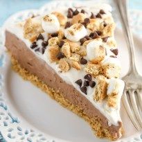 A homemade graham cracker crust topped with a no-bake chocolate cheesecake filling and marshmallow fluff whipped cream. This No-Bake S'mores Cheesecake is the ultimate summer dessert! S’mores No Bake Cheesecake, Smores No Bake Cheesecake, Smore Cheesecake No Bake, No Bake Smores Cheesecake, S’more Cheesecake, S’mores Cheesecake Recipe, S’mores Cheesecake, No Bake Smores Pie, Smores Cake Recipe