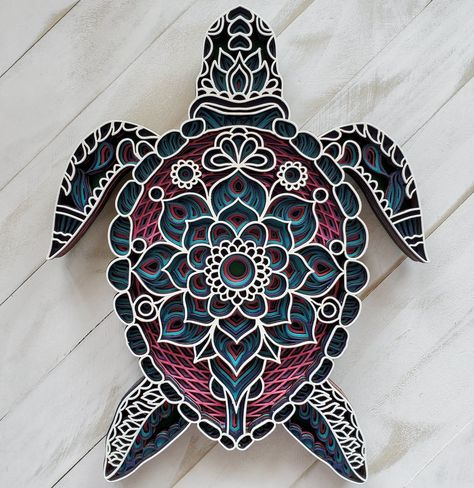 This beautiful intricately cut six layer wooden honu (turtle) mandala will add a fun and beachy vibe to any room.  The mandala measures 9.25" length x 8" width and 3/4" in depth and is painted in beachy colors.  Made with aloha in Hawaii, USA. Kurma Avatar, Sea Turtle Mandala, Pineapple Ideas, Mosaic Tattoo, Types Of Turtles, Beginner Wood Burning, Wood Mandala, Turtle Wall Decor, Mandala Turtle