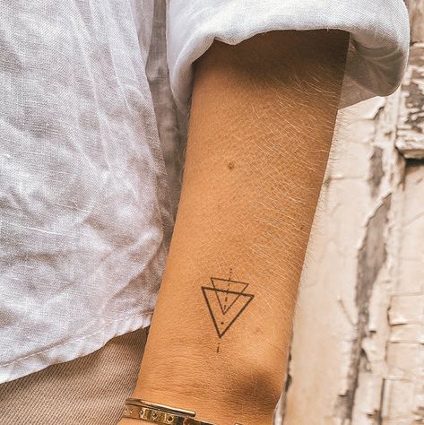 Triangle Wrist Tattoo, Triangle Tatoo, Triangles Tattoo, Geometric Tattoo Wrist, Dandelion Tattoo Small, Triangle Mandala, Tattoo Triangle, Small Anchor Tattoos, T Rex Tattoo