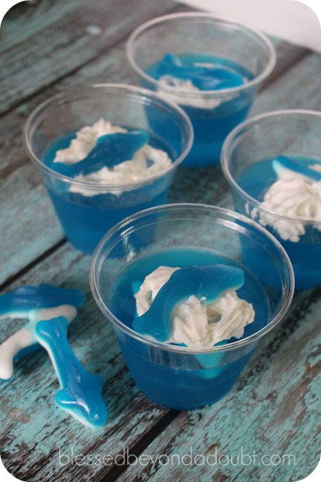 How to Make Shark Jello Treats! Shark Jello, Shark Jello Cups, Different Types Of Sharks, Jello Cups, Happy Shark, Blue Jello, Types Of Sharks, Ocean Baby Showers, Jello Desserts