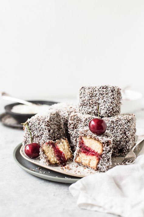 Soft light and airy sponge filled with cherry conserve and dipped in chocolate then icing are as delicious and Australian as you can get. By Emma Duckworth Bakes Lamingtons Recipe, Cake Stall, Torte Cupcake, Fruit Dessert Recipes, Chocolate Icing, Cannoli, Afternoon Snacks, Strawberries And Cream, Fruit Desserts