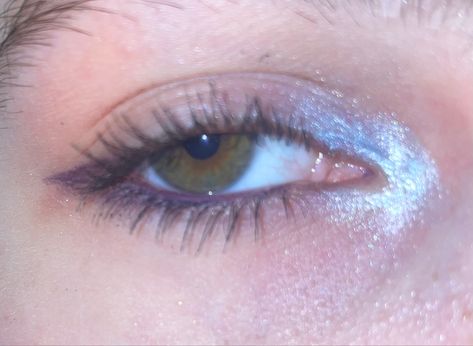 Sparkly Inner Corner Eye, Blue Purple Eyeliner, Blue Eyeshadow Inner Corner, Silver Inner Corner Makeup, Sparkly Makeup Products, Snowy Eye Makeup, Glitter Inner Corner Eye, Purple Inner Corner Makeup, Purple Eyeliner Brown Eyes