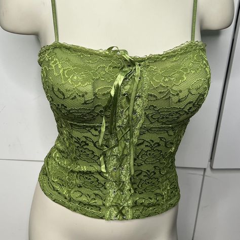 Brand  New
green stretchy corset style top
y2k dance... - Depop Y2k Grunge Fairy, Green Lace Top, Corset And Skirt, Green Corset, Corset Style Tops, Dance Tops, Grunge Fairy, New Green, Corset Style