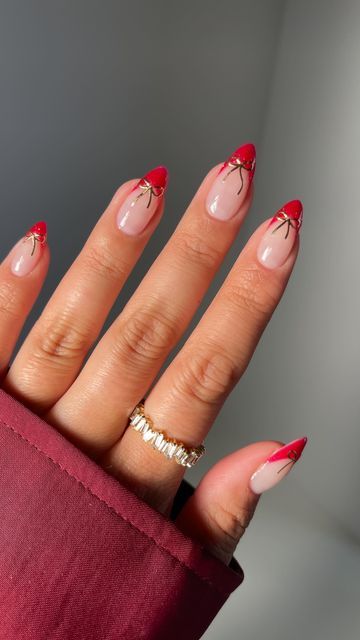 Teerah on Instagram: "something classic but chic 🍒🎀♥️✨  @leminimacaron  Ruby red Too coat  Aff code “embrace15”  @daily_charme  Nail stickers aff code “embrace”  #leminimacaron #frenchtip #chicnails #nailtutorials #frenchtipsnails  nails, red, bow nails, nail stickers, French tips, chic, classy, aesthetic nails, gel, gel polish, gel nail art, Pinterest nails, tutorials" Almond Red French Tip Nails With Chrome, Nails With One French Tip, Red French Bow Nails, Red And Gold Bow Nails, Red French Tip With White Bow, French Tip Stickers, Red French With Bow, Thick Red French Tip, Bow Nail Tutorial