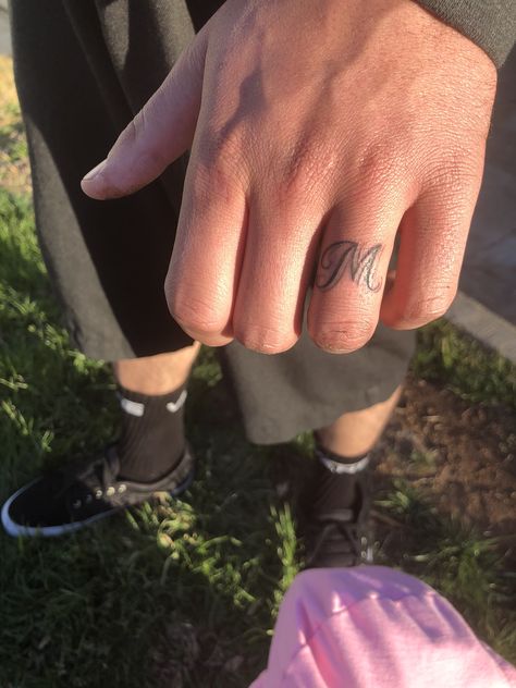 Finger Tattoos Ring Finger Tattoo, Mens Ring Finger Initial Tattoo, Initals Tattoo On Ring Finger, M Ring Finger Tattoo, Letter Tattoo On Ring Finger, M Ring Tattoo, T Finger Tattoo, E Finger Tattoo, Husband Ring Tattoo