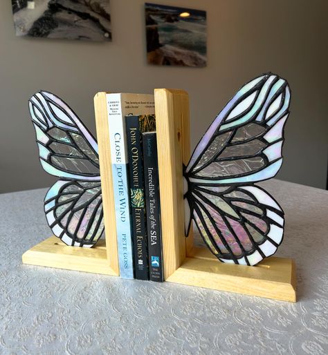 Finishing up my butterfly bookends this weekend. 🦋 I’m so happy with how these have turned out. Monarch on Oak and Glass wing on Pine. Bookend wood work by my dad 🥰 glass by me. A few more finishing touches and these will be ready to go. 🦋💕 Stained Glass Butterfly Bookends, Stained Glass Bookends, Butterfly Bookends, Paint Room, Sara Haines, Comfort Space, Diy Bookends, My Butterfly, Glass Book