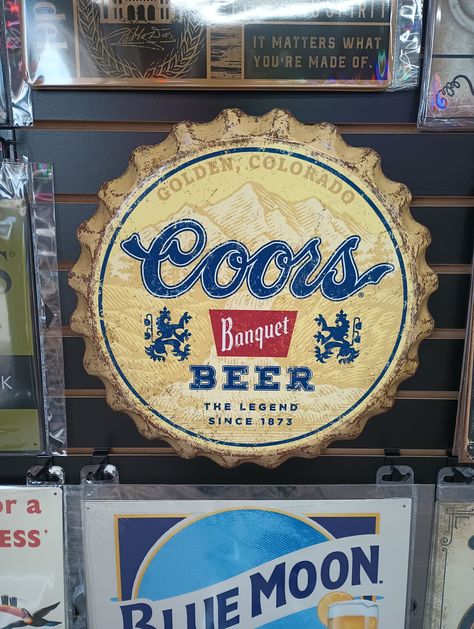 18" Coors Banquet Beer Bottle Cap Sign Weathered Coors Signs Vintage Beer Ads Home Bar Decor Garage Decor for Men Man Cave Decor Gifts Guys Weathered looking Coors Banquet Beer bottle cap sign made to look vintage *Official Licensed Product* DIMENSIONS: approximately 18" diameter - made NEW in the USA! - created with aluminum  - single sided, lightweight, comes with holes and is ready to hang >> VISIT US @ www.neongarages.com for more home bar decor, customizable gas pumps, personalized gifts, n Bottle Cap Sign, Metal Beer Signs, Vintage Beer Signs, Beer Ads, Coors Banquet, Pompe A Essence, Beer Ad, Beer Bottle Cap, Ad Home