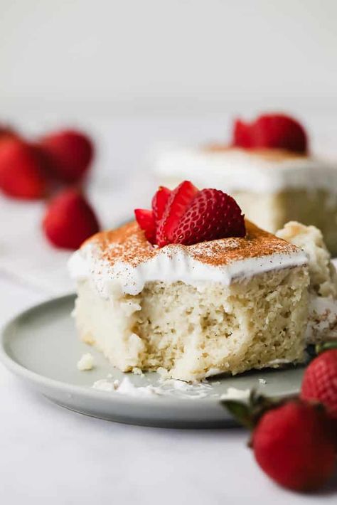 The traditional version of this cake is soaked in mixture of 3 milks and topped with whipped cream, so creating a vegan version was quite a project! This Vegan Tres Leches Cake is one of my favorites and consists of a light vanilla cake soaked in a triple dairy free milk mixture. Top with fluffy coconut whipped cream, a sprinkle of cinnamon and sliced strawberries. Vegan Sweetened Condensed Milk, Mexican Cake, Tres Leches Cake Recipe, Inside Cake, Moist Vanilla Cake, Vegan Whipped Cream, Leches Cake, Vanilla Cake Mixes, Fruitcake Recipes