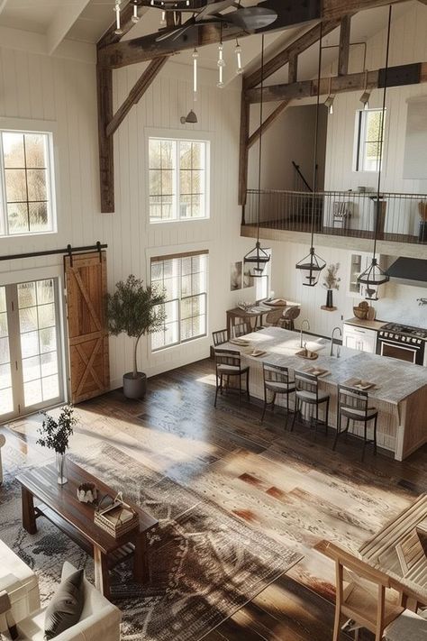 25 Barndominium Ideas - Remodr Farmhouse With Large Windows, Rustic House Modern, Living Room Designs Open Space, Old Farmhouse Barndominium, Open Plan Barndominium, Barndominium Ideas Exterior Wrap Around Porch, Barndominium Ideas Big Windows, Big Family Home Ideas, Kitchen In Barndominium