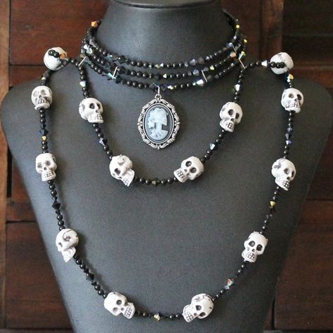 Black choker necklace made from memory wire with long ropes of black beads criss-crossing around the neck for stability. Black jade, swarovski crystal, acrylic skull beads and an acrylic skull cameo for all your gothic, steampunk, and Dia De Los Muertos needs. Size automatically adjusts. Skull Cameo, Diy Skulls, Weird Jewelry, Skull Beads, Black Jade, Black Choker Necklace, Gothic Steampunk, Diy Wire Jewelry, Skull Jewelry