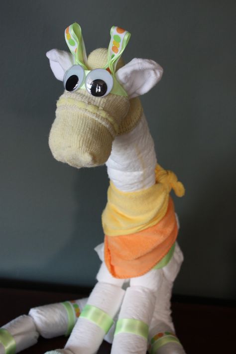 Diaper Animals, Giraffe Baby Shower Theme, Trendy Baby Shower Themes, Baby Shower Favors Diy, Diaper Gifts, Sigh Of Relief, Baby Shower Giraffe, Baby Shower Crafts, Baby Shower Diaper Cake