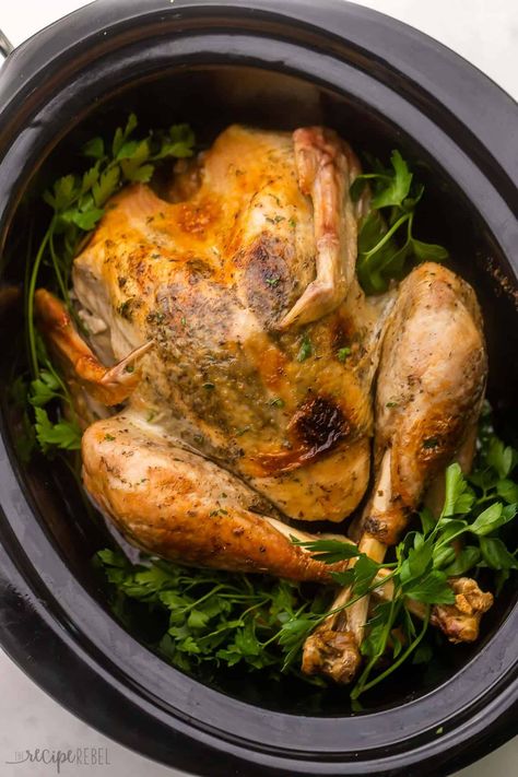 Crockpot Turkey with Garlic Butter is my go-to method for cooking a whole turkey! This is the easiest way you'll ever prepare the whole bird and it always turns out juicy, tender, and flavorful as can be with all of that garlic butter. It's fail-proof! #crockpot #slowcooker #turkey | holiday meals | christmas dinner | thanksgiving dinner | dinner ideas | crockpot meals | slow cooker turkey | how to cook a whole turkey Slow Cooker Thanksgiving Turkey, How To Cook A Turkey In The Crockpot, Slow Cooker Turkey Breast Bone In Recipes, Slow Cooker Bone-in Turkey Breast, Cooking A Turkey In A Crock Pot, Crock Pot Whole Turkey, Small Turkey In Crockpot, Keeping Turkey Warm In Crockpot, Turkey In Crockpot Whole