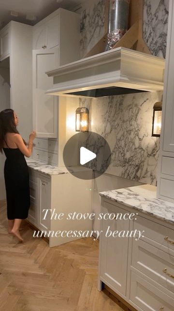 Christina Serrano on Instagram: "There’s no actual need for a stove sconce, most hoods have a light anyway.🧐 But how about adding beauty just for beauty’s sake… Sconce lighting is romantic, and dimmed lighting is soo much better when entertaining friends. 💫 

#southernlivingmag #sconces #kitchenlighting #sconcelighting #romanticdecor 
 #kitchengoals #kitchenrenovation #marbleslab #kitchenrenovation #newconstruction #southernlivingmagazine #raleighrealestate #durhamnc #kitchendesign #renovations #renovationproject #diyhomedecor #luxemagazine #northcarolinahomes #interiorgoals #kitchenlighting" Southern Living Magazine, Entertaining Friends, North Carolina Homes, E Magazine, Romantic Decor, Marble Slab, Renovation Project, Kitchen Lighting, Kitchen Renovation