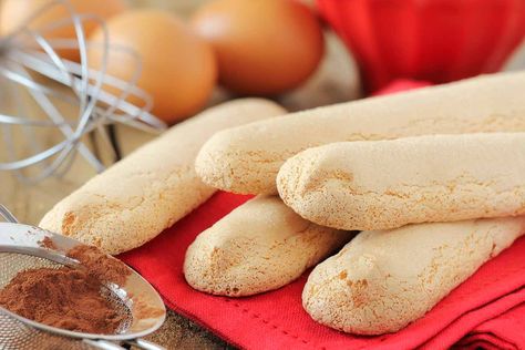 Homemade Savoiardi Biscuits also known as the lady's finger biscuits are delicious Italian sponge fingers. They a little crisp to bite in and soft and airy inside.  I use this recipe in layer fruit cakes as they absorb the juices from liquids very well and bring out great flavors. It is popularly used for making Tiramisu, the delicious cheese dessert from Italy. Here are more party dessert recipes to try  Dragon Fruit and Rose Water Popsicle Recipe Dairyfree Balsamic Strawberry Ice-cream Reci... Savoiardi Recipe, Strawberry Cream Cheese Dessert, Finger Biscuits, Authentic Italian Desserts, Cream Cheese Recipes Dessert, Strawberry Ice Cream Recipe, Party Food Dessert, Baked Strawberries, Lady Fingers