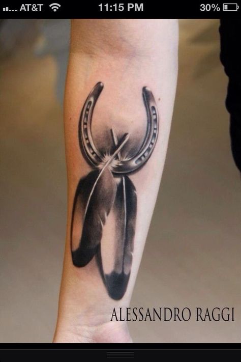 Horse shoe tattoo. I want it smaller and with 3 feathers because my chiefs reg name is "Chief Three Feathers" Tattoo Indien, Feather Tattoo Meaning, Horse Shoe Tattoo, Horse Tattoo Design, Cowgirl Tattoos, Shoe Tattoos, Mini Lop, Western Tattoos, Dream Catcher Tattoo