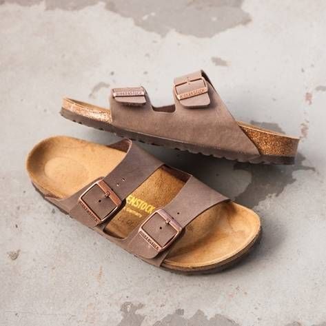 <p>Slide into classic sandal bliss with the Birkenstock Arizona! Promoting premium comfort, balance, and support, this synthetic leather slide sandal features a textured Birkibuc™ upper and anatomically correct cork/latex footbed molded to the contours of your foot. Includes adjustable buckle straps for notching up that perfect fit, a flexible EVA outsole for lightweight shock absorption, and moisture-wicking dual layer jute for sandal preservation and durability. <b&g... Birken Stocks, Birks And Socks, Sandal Outfits, Oxford Shoes Style, Tokyo Street Fashion, Birkenstock Sandals Arizona, Birkenstock Sandals, Leather Slide Sandals, Shoe Lace Patterns