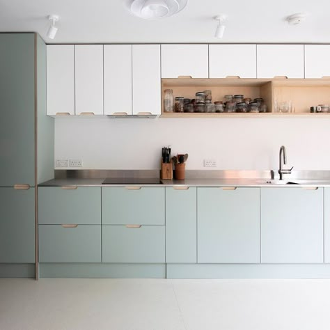 The cool palette of white and light sage fronts with a stainless steel worktop is countered with the warmer tones and texture of open birch… | Instagram Steel Worktop Kitchen, Stainless Steel Worktop, Sage And White Kitchen, Wood Bench Seating, Seafoam Kitchen, Pistachio Kitchen, Light Kitchen Colors, Light Green Kitchen, Light Wood Kitchens