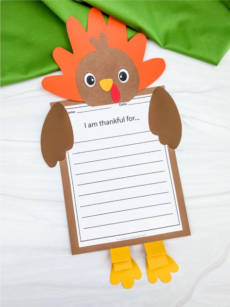 Give your kids a fun and easy craft to do this Thanksgiving. This turkey craftivity is perfect for elementary school children and can be used as both an activity and writing prompt! Download the free printable template on the blog! Turkey Activities For Kids, Build A Turkey, Kindergarten Thanksgiving Crafts, Teach Handwriting, Turkey Activities, November Preschool, Turkey Printable, Thanksgiving Classroom Activities, Thanksgiving Arts And Crafts