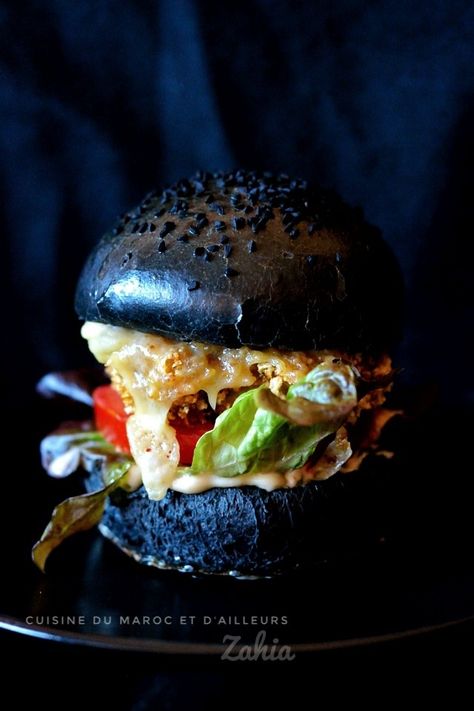 Fish burger with a black bun Black Bun, Mini Burger, Fish Burger, Mini Burgers, Salmon Burgers, A Black, Fish, Ethnic Recipes, Quick Saves