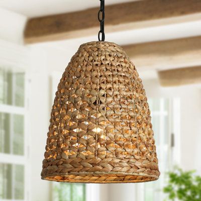 With a natural woven rattan design and hand-woven value, this rattan pendant lighting seamlessly combines farmhouse touch with a modern simplicity, delivering an airy and free sense. With meticulous handcraft, every strand in brown is intricately woven to form a simple bell shape, bringing a touch of rustic charm and warmth to your indoor space. Diffused from a bulb(not included/up to 60W), the warming lighting goes through the gaps of each rattan and the shadows play with the lighting, lit up an instant romantic ambiance. Suspend alone or a row in your kitchen island, dining room, entryway, hallway or the outdoor area, this rattan pendant expresses a nature and freedom to life and space. | Bay Isle Home™ Irja 1 - Light Brown Pendant, Rattan in Black / Brown | 17.3 H x 12.6 W x 12.6 D in | Wicker Light Fixture Dining Rooms, Beachy Kitchen Pendant Lights, Wicker Pendant Lights, Boho Front Porch, Rattan Pendant Lighting, Light Over Sink, Basket Pendant Light, Billiard Table Lights, Woven Pendant Light