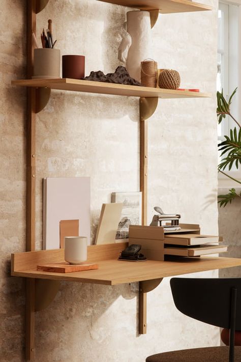 We love modern wall-mounted desks at Remodelista. For us, wall-mounted furniture is a saving grace for small-space living. And don't underestimate the advantages to wall-mounted, modular shelving systems. Similar to wall-mounted desks, they can be engineered to fit any space; but unlike built-ins, they can be disassembled and reinstalled if you relocate. Mid Century Shelving Unit, Mid Century Shelving, Custom Dining Chairs, Buy Desk, Wall Mounted Desk, Console Design, Wall Desk, Oak Desk, A Desk