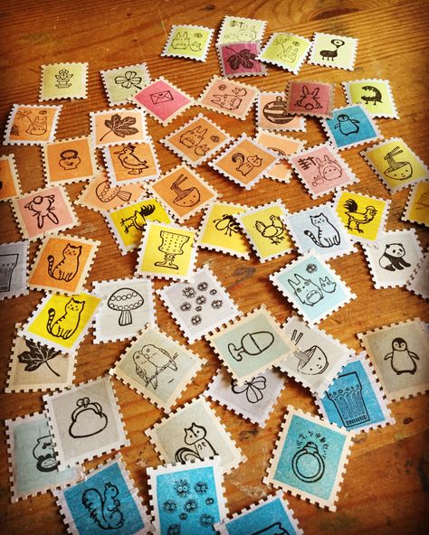 homemade postage stamps, using rubber stamps and a postage stamp paper punch. LOVE!