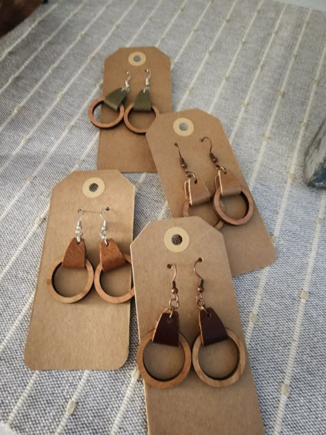 Handmade leather/cork/wood earrings Wood Earrings Cricut, Wood And Leather Earrings, Wood And Leather Projects, Leather Earring Ideas, Leather Keychain Ideas, Wood Earrings Diy, Small Leather Projects, Leather Earrings Diy, Wooden Earrings Handmade